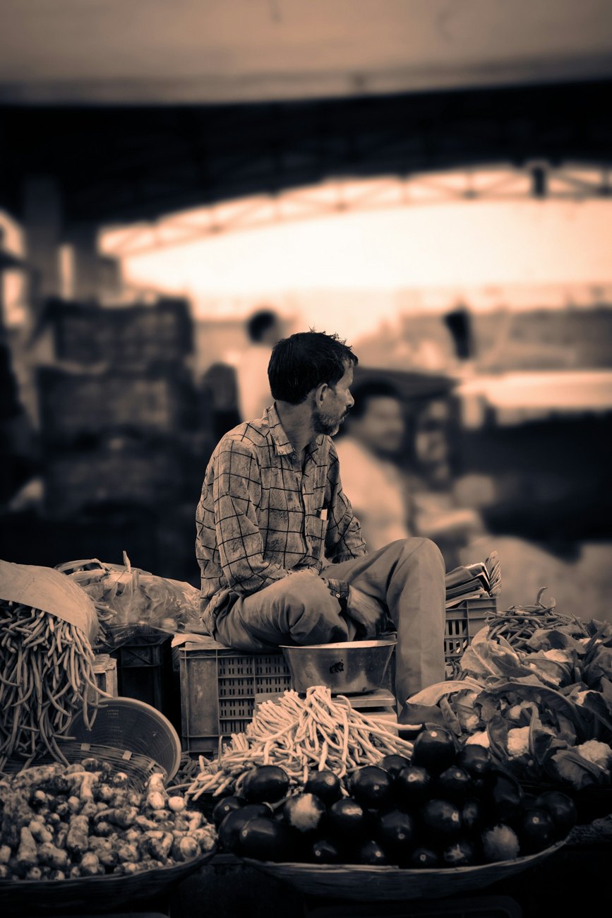 A vegetable merchant at an Indian market